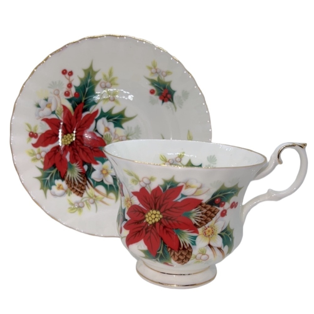 ROYAL ALBERT POINSETTIA FOOTED CUP AND SAUCER BONE CHINA ENGLAND VINTAGE